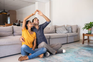 Couple celebrating getting their mortgage